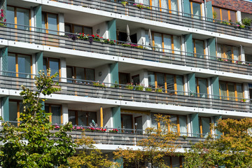 Front of a modern apartment house with a lot of balconies