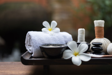 Spa massage compress balls, herbal ball on the wooden with treaments spa , Thailand, select focus.