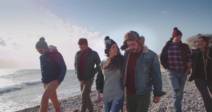 Friends having fun at the beach on a sunny day
