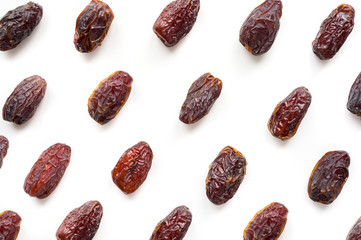 Isolated Medjool Dates. Top view. Fruit pattern. 