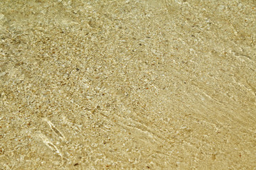 Wave of the sea on the sand beach