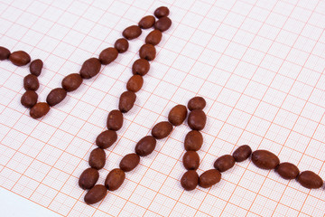 Cardiogram line of roasted coffee grains, medicine and healthcare concept