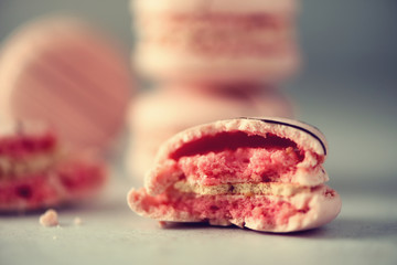 Pink french macaroons. Pastel colors macarons with copy space, top view. Holidays and celebrations concept. Sweet gift for woman, girl