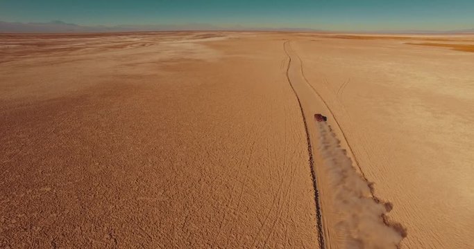 Aerial view of Mirror of Salar de Tara, Atacama desert, Chile from above. Salar de Adacama. Car. 4K. June 2016