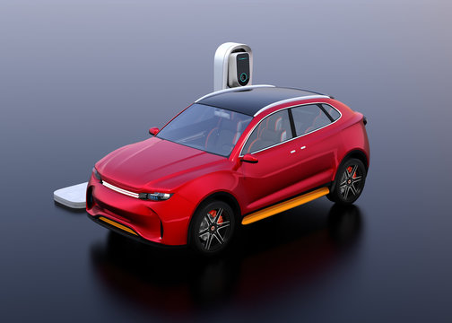 Red electric SUV car charging in charging station. 3D rendering image.
