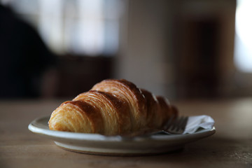 croissant on wood background