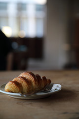 croissant on wood background