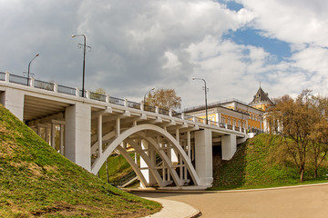 White concrete bridge across the street.