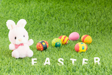 Bunny toy and Easter eggs with text