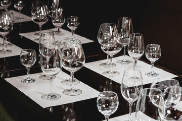 empty glasses of different shapes served for a wine tasting