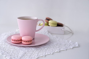 Macaroon and Coffee on white table