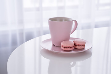 Macaroon and Coffee on white table