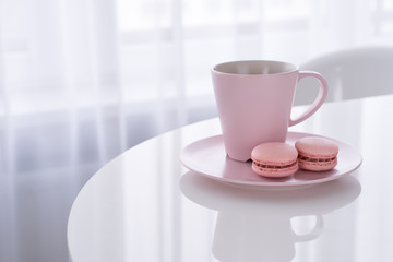Macaroon and Coffee on white table