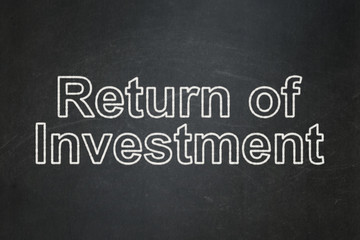 Finance concept: text Return of Investment on Black chalkboard background