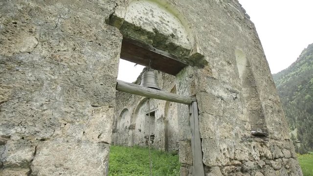 Old Georgian church bell in high caucasus mountains