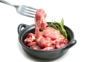 Raw pork meat with spices in bowl,ready to cook.