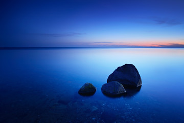 After Sunset, Boulders in the Calm Sea, Baltic Sea, Rugen Island, Germany