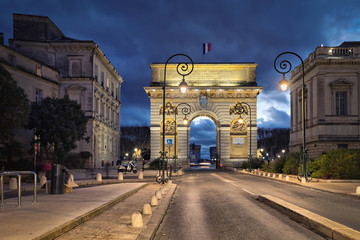 The Porte du Peyrou -  a triumphal arch in Montpellier at dusk, Occitanie, France
