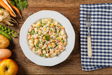 Traditional salad with cooked vegetables with mayonnaise.