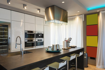 Modern kitchen with island and stools