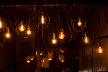 Vintage tungsten lamps in stylish loft interior