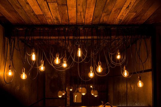 Vintage tungsten lamps in stylish loft interior