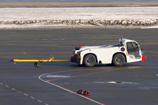 Tow truck for airplanes at the airfield.