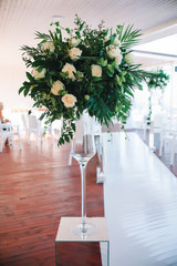 wedding decoration with elements vases wedding arch of greenery of white roses