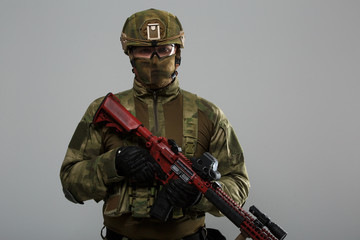 Image of military man with gun