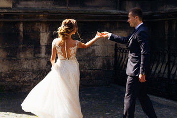 couple dancing in old city