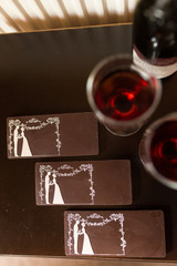 Three chocolate bars with the image of the bride and groom. Chocolate candy, tiles.