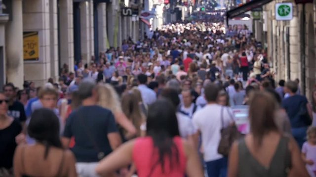 Crowd in City - slow-motion. Countless people walking in a big city