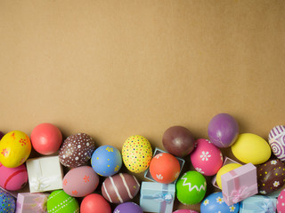 Easter eggs on the brown background.