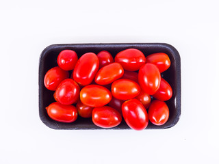 Cherry plump tomato isolated on white background