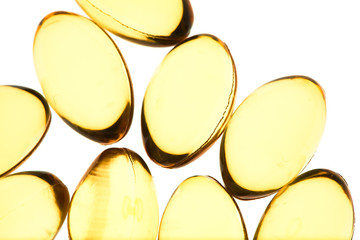 Yellow pills isolated background