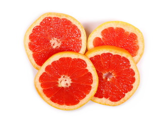 Obraz na płótnie Canvas Grapefruit slices isolated on white background, top view
