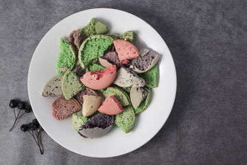 Crumbed Macaroons on white background