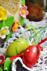 Easter eggs with homemade easter cake, Holiday background. Vertical image.