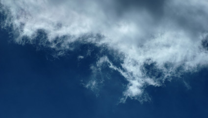 Clouds abstract as wallpaper / In meteorology, a cloud is an aerosol comprising a visible mass of minute liquid droplets, frozen crystals, or particles suspended in the atmosphere