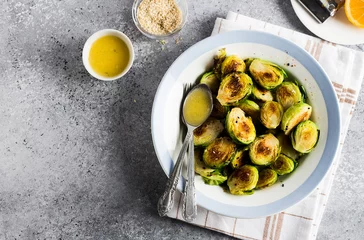 Deurstickers Roasted brussels sprouts cabbage with salt pepper sesame © madiwaso