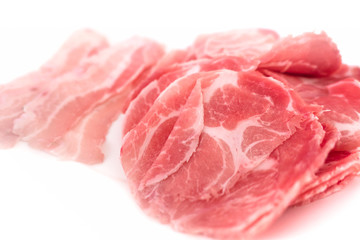 pork meat source of protein thin slice on white background