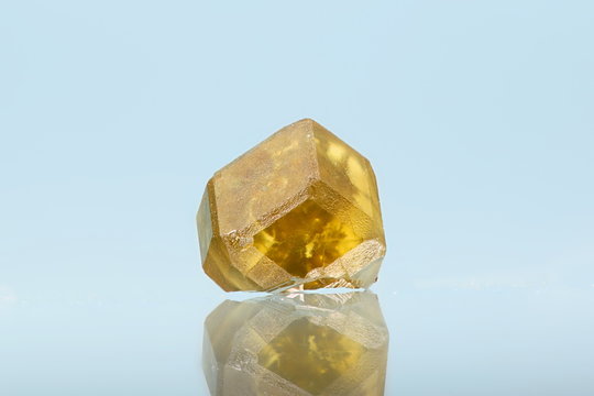 Garnet gemstone called andradite or demantoid from Urals, Russia