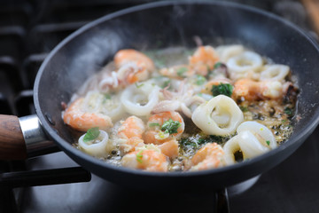 cooking pan with seafood