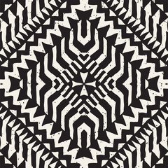 Seamless ethnic and tribal pattern. Hand drawn ornamental stripes. Black and white print for your textiles. Vector background.