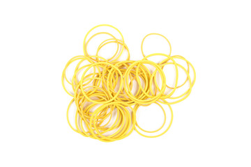 Pile of yellow rubber bands isolated on white background. Packaging supplies and accessory. Thin rubber bands.