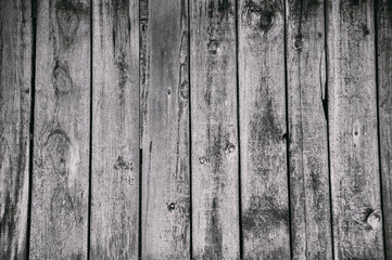 Fototapeta premium Old wooden vertical planks texture with scratches and cracks. Wooden background for design