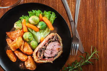 Pork tenderloin in wellington style in puff pastry