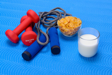 Breakfast with milk and cornflakes. Frame, healthy.