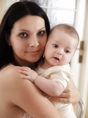 mother with baby at home