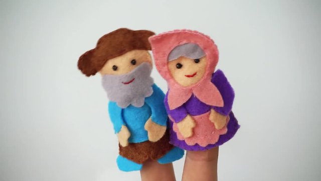 Homemade multi-colored finger dolls. Performance in the kindergarten. Funny puppet show, theater.